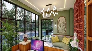 A modern living room with large windows, a flat-screen TV, a sofa, and decorative plants. - Palette Hotel Millennium City Centre (Gurugram)