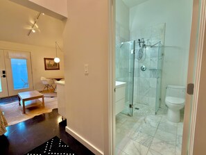 Shower, hair dryer, towels, soap