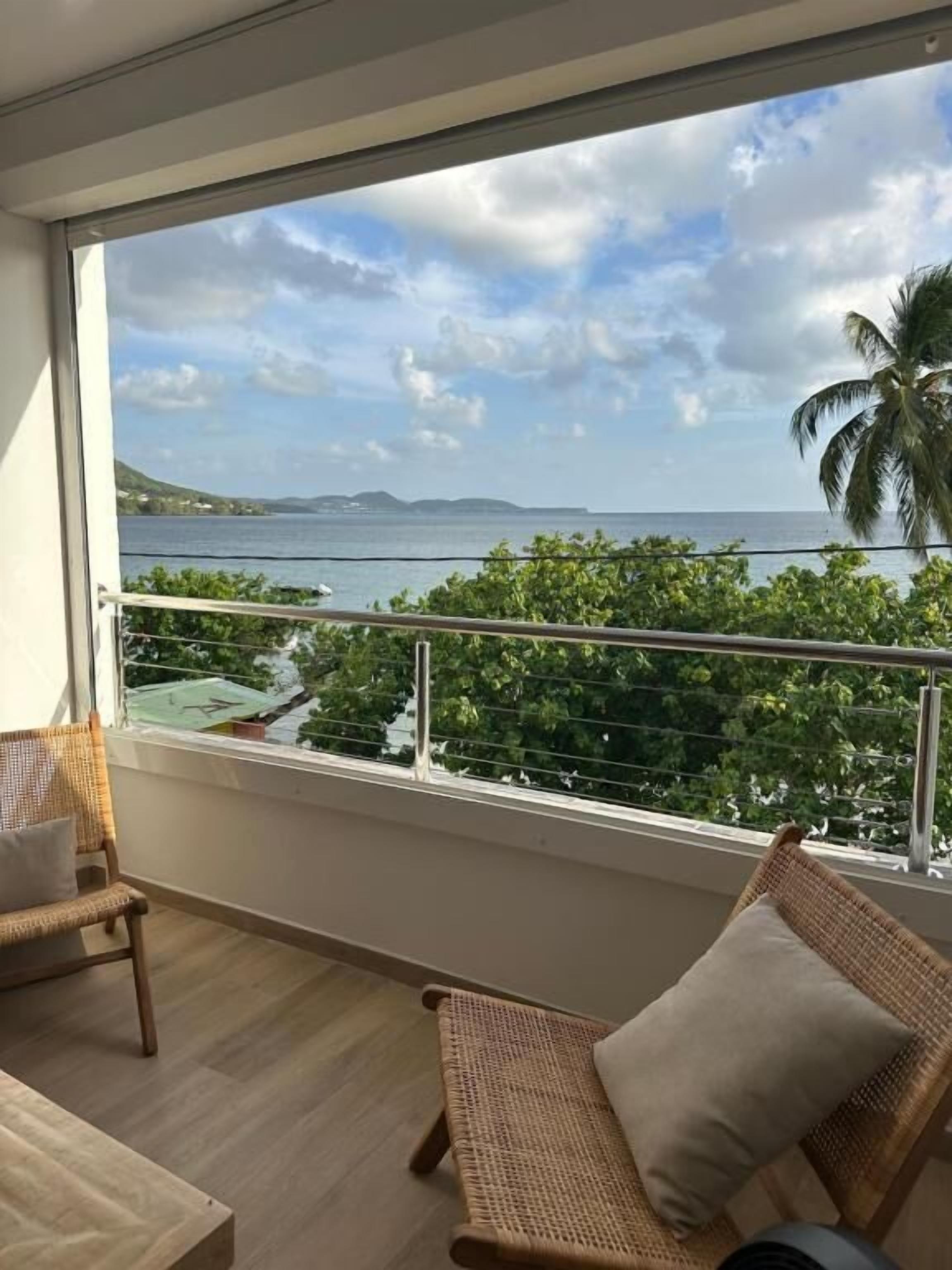 Suite, vista mare | Interni