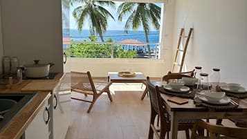 Suíte família, vista para o mar | Opções para refeição