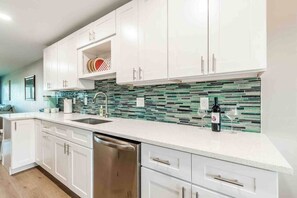 Fridge, microwave, oven, stovetop - Waterfront Updated Coastal Condo 2 Bed/2 bath (Clearwater)