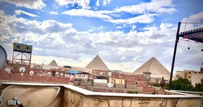 Deluxe Double or Twin Room, Balcony, Mountain View | Property grounds - Farasha pyramids Hotel (Giza Governorate)