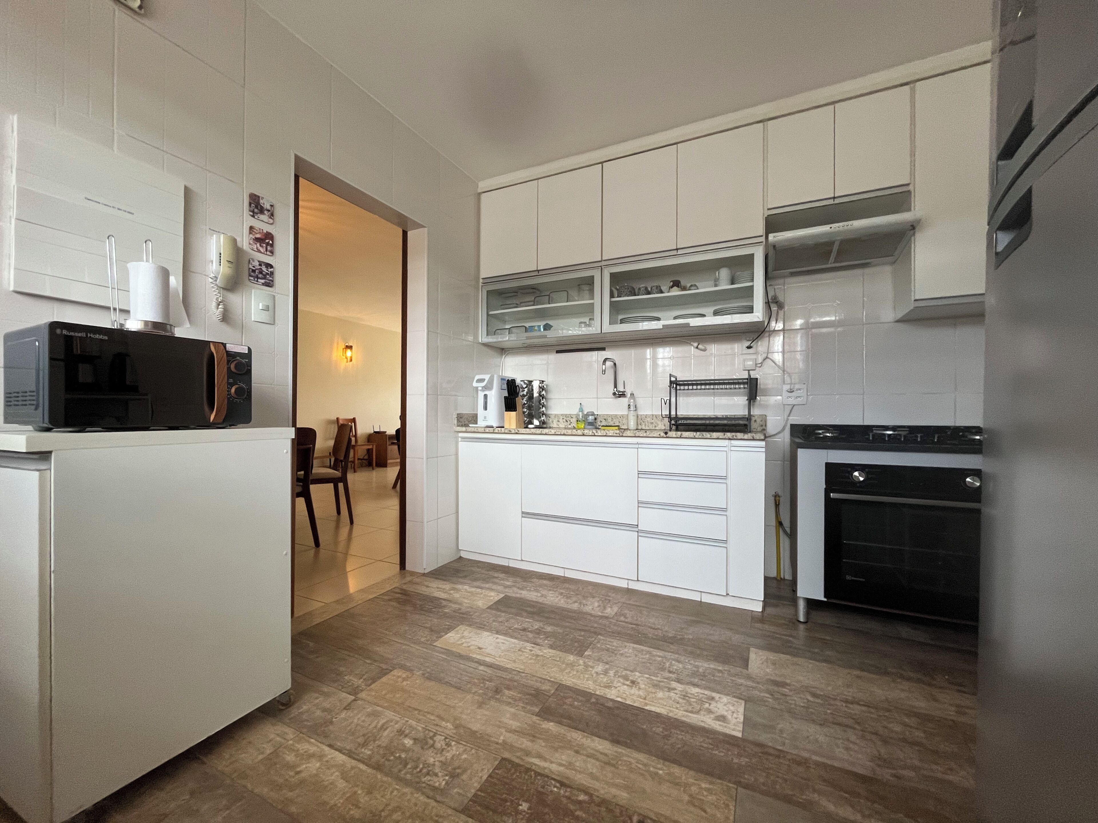 Full-size fridge, microwave, oven, cookware/dishes/utensils