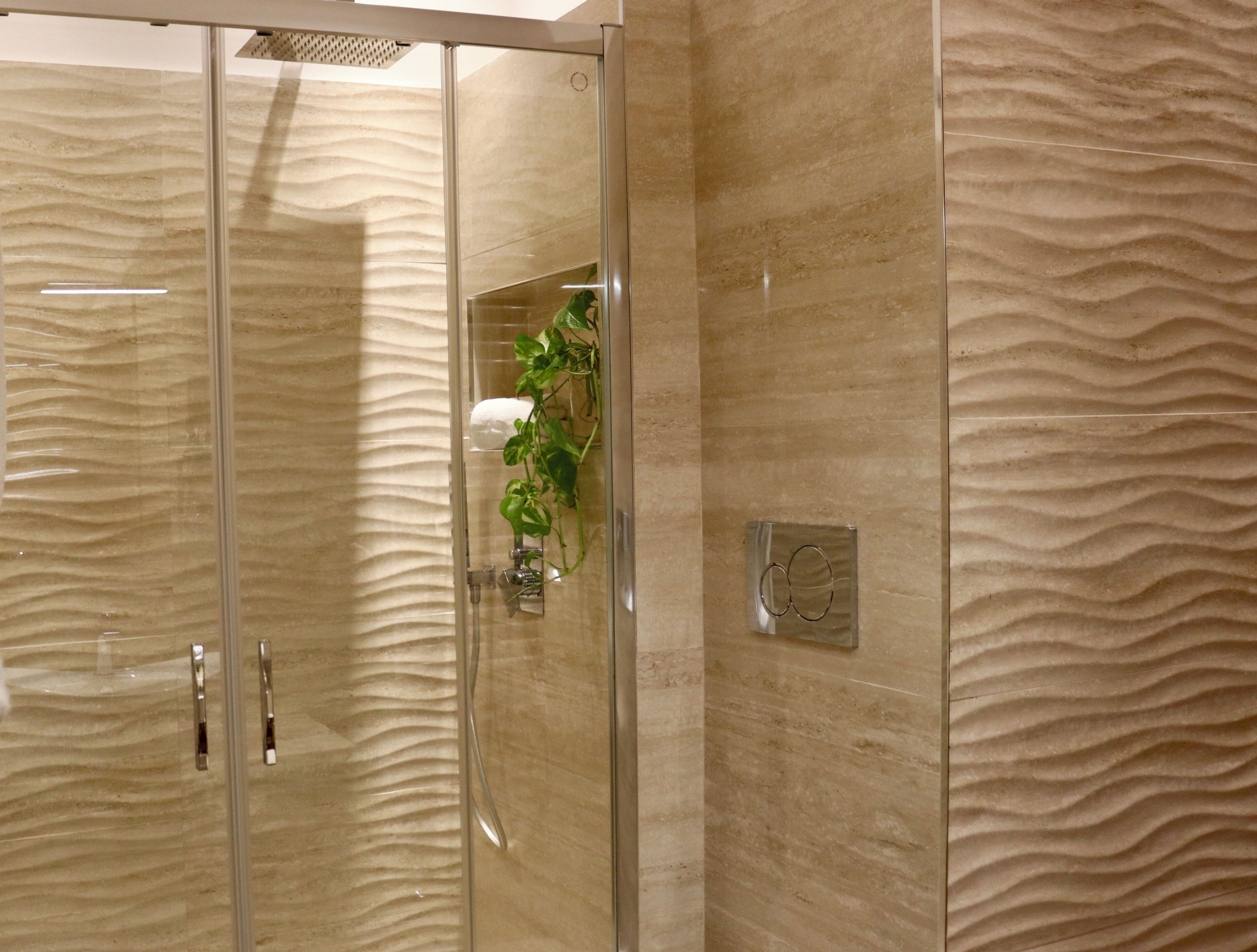 Dutxa, assecador de cabells, bidet i tovalloles 