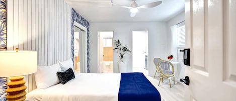 1 bedroom, desk, iron/ironing board, travel crib