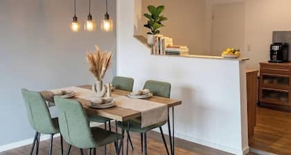 Stylish apartment with home office & spa bath.