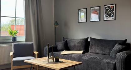 Stylish apartment with home office & spa bath.