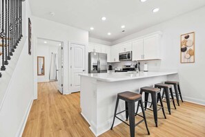 Fridge, microwave, oven, stovetop - Indigo Wake Beach House with Pool Near Beach (Myrtle Beach)