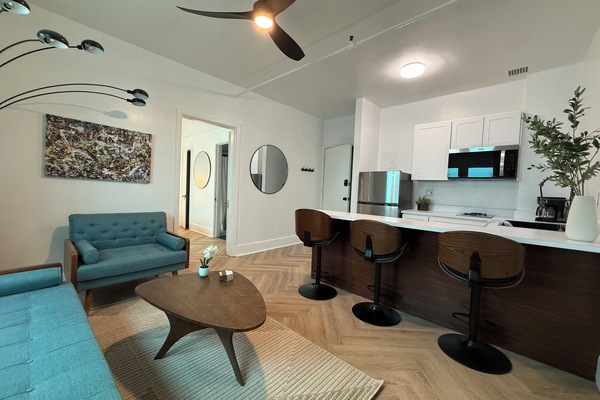 Deluxe Apartment, 2 Bedrooms, 2 Bathrooms | Living area | 55-inch flat-screen TV with digital channels