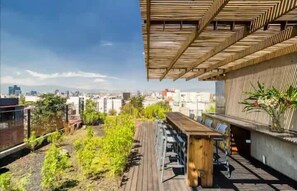 Outdoor dining - Chic Roma Norte Apartment w/ Private Balcony (Mexico City)