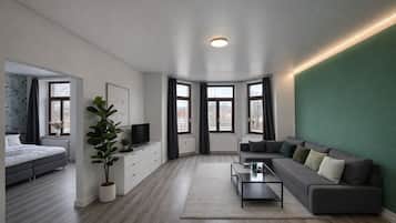 Comfort Apartment, 1 Queen Bed with Sofa bed, Kitchenette | Living area | 50-inch Smart TV with digital channels