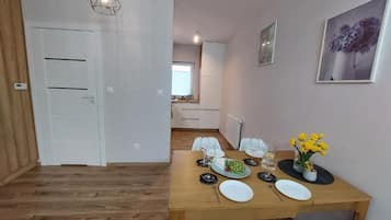 Family Apartment, Balcony, Garden View | Dining