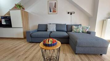 Family Apartment, Balcony, Garden View | Living area