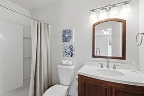 Hair dryer, towels, soap, toilet paper