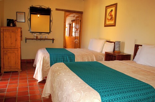 Room Cuxtitali Hotel Adobe and Teja in picturesque neighborhood of San Cristobal