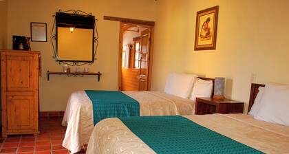 Room Cuxtitali Hotel Adobe and Teja in picturesque neighborhood of San Cristobal