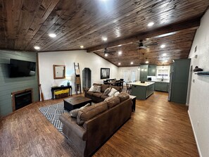 TV, fireplace - Edgewater at Lake Greeson – Family Retreat w/ Game Room & Theater (Kirby)