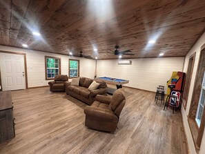 TV, fireplace - Edgewater at Lake Greeson – Family Retreat w/ Game Room & Theater (Kirby)