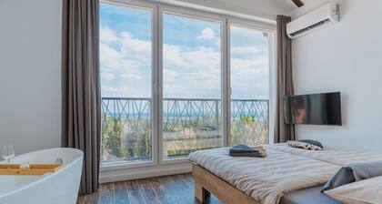 Stay among vineyards with private sauna and nature views