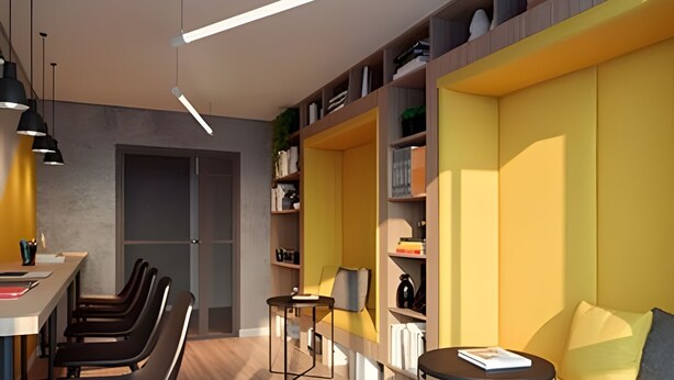 A modern interior with a dining area, a sofa, and built-in bookshelves. - Studios Expo Stay  (São Paulo)