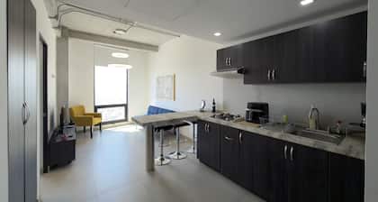 Suite Elegante con Vistas a la Ciudad | Estacionamiento