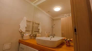 Hair dryer, towels, soap, toilet paper