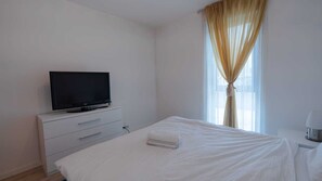 1 chambre, fer et planche à repasser, Wi-Fi gratuit, draps fournis