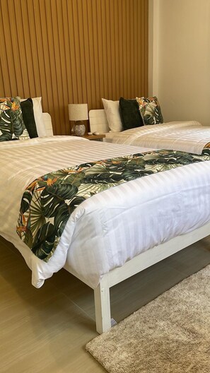 2 habitaciones, tabla de planchar con plancha, wifi y ropa de cama 
