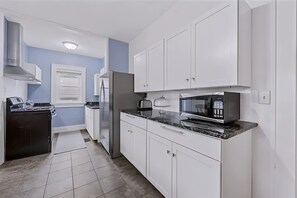 Private kitchen - Group‑Friendly Home w/ Patio, 3 Bath & 2 Kitchens (Iowa City)