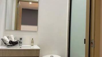 Hair dryer, towels, soap, shampoo