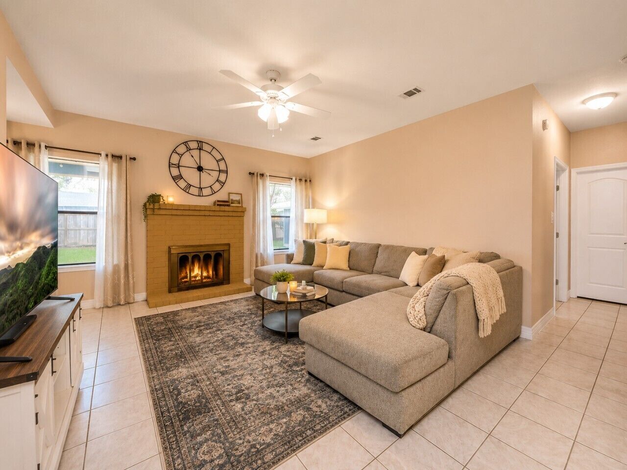 TV, fireplace, books