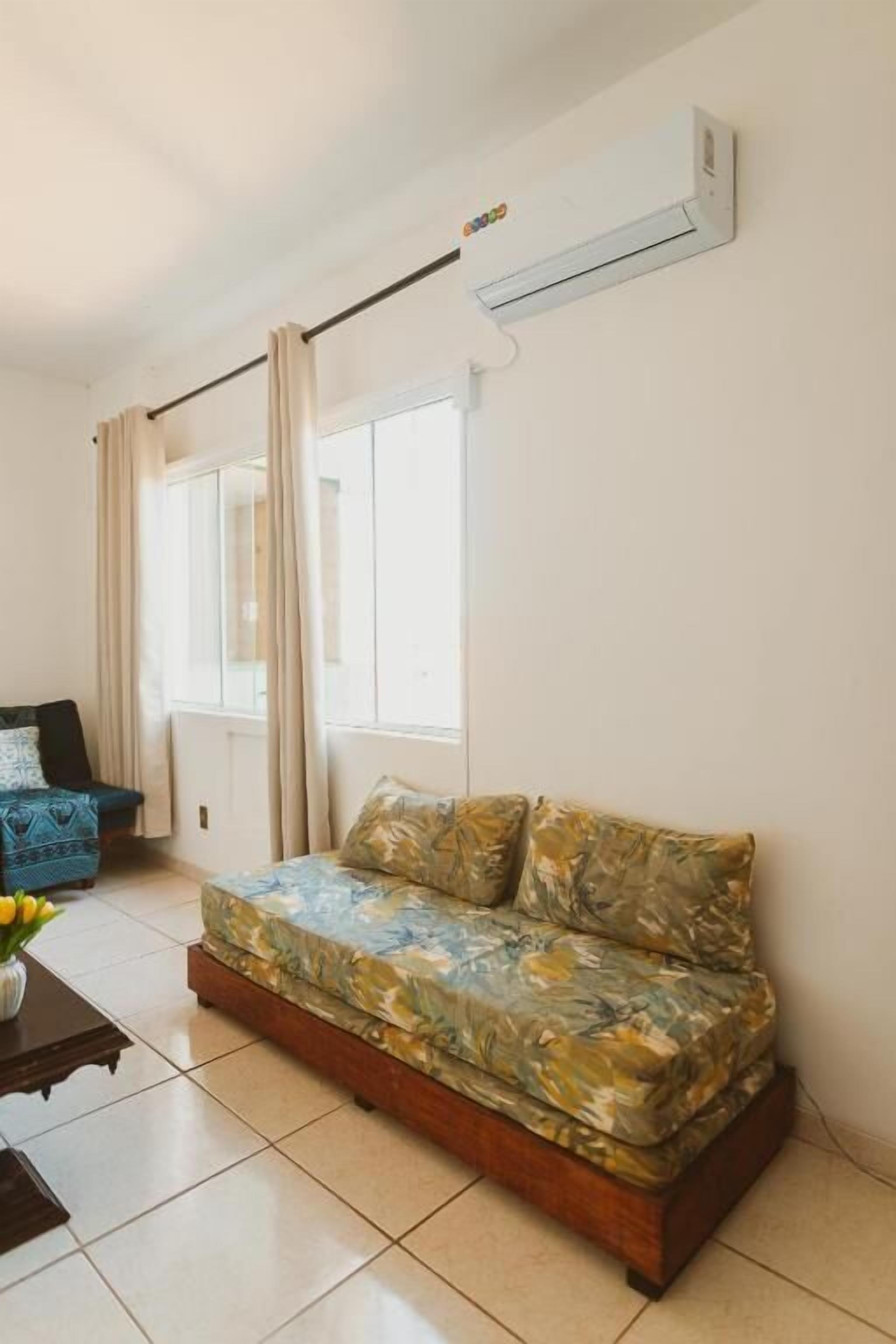 Apartamento clássico, vista para a cidade | Área de estar