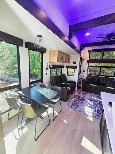 Luxury Cabin RV - The Olympic (Sleeps 6) - The most luxurious stay at RV@Olympic — brand-new Black Label with king bed, electric fireplace & LED mood lighting.