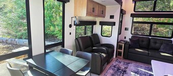 Luxury Cabin RV - The Olympic (Sleeps 6) - The most luxurious stay at RV@Olympic — brand-new Black Label with king bed, electric fireplace & LED mood lighting.