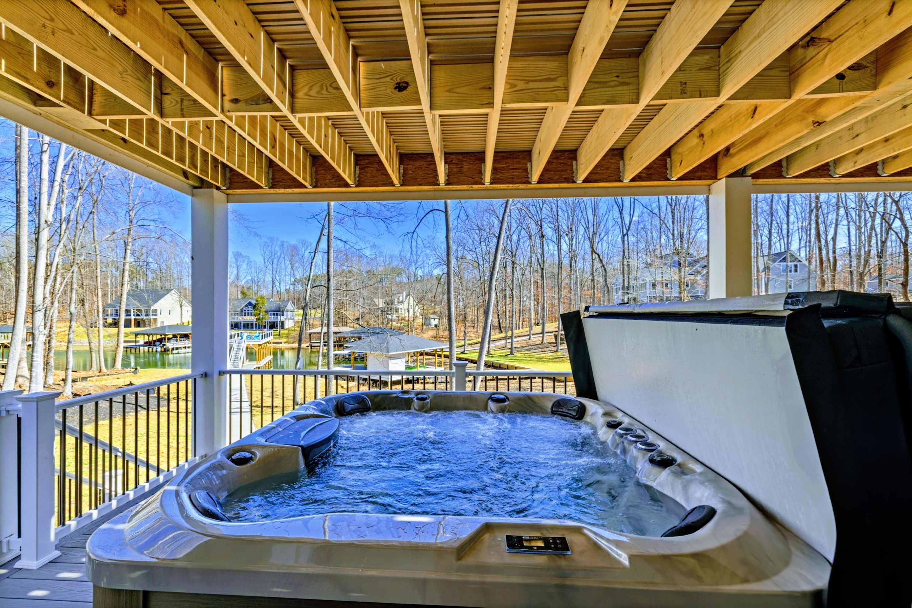 Star-Lit Soaking - Unwind under the stars in the hot tub as the lake reflects the night sky.
