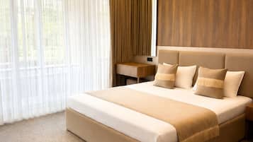 Deluxe Double Room, City View | In-room safe, desk, laptop workspace, blackout drapes