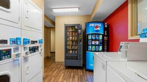 A laundry area with multiple washing machines, a vending machine, and a Pepsi refrigerator. - 1 Queen Bed | Non-Smoking, Kitchen, Sofa-Bed (Fairfield)