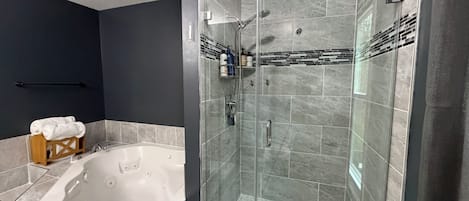 Jetted bath, hair dryer, towels, soap