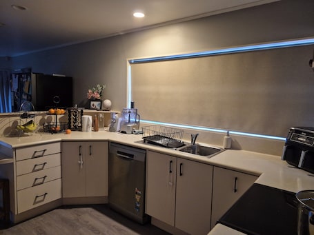 Fridge, microwave, oven, stovetop. Three Beds in the Heart of the Royal City