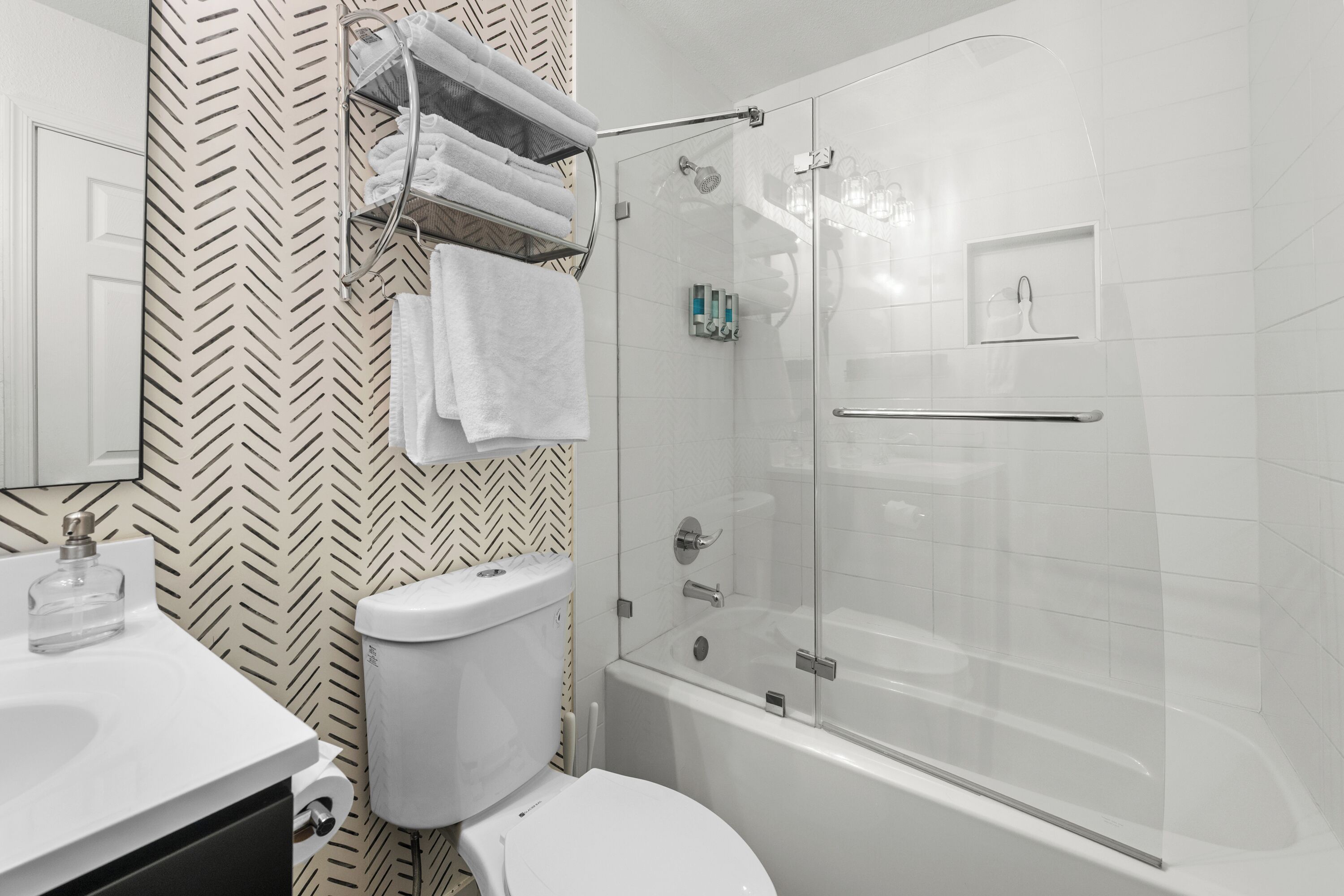 Hair dryer, towels, soap, toilet paper