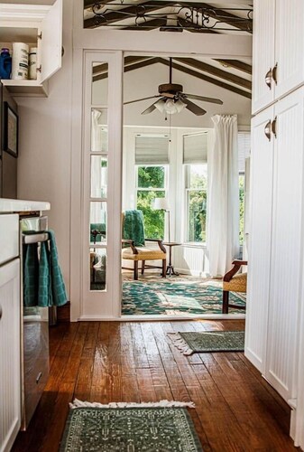 Historic cottage with a bright, sun-drenched interior, offering the ultimate peaceful getaway.