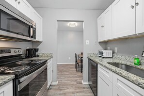 Fridge, microwave, oven, stovetop - Charming 2-bedroom 1-bath with modern style appeal (Denton)