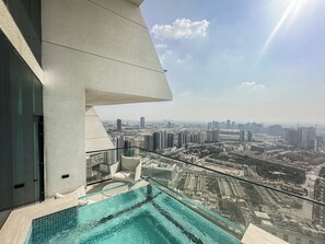 Outdoor pool, open 9:00 AM to 9:00 PM, free pool cabanas, pool loungers - Binghatti Phantom (Dubai)