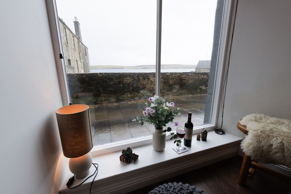 Window seating area with sea views