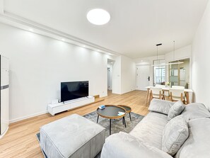 City View 2BR Serviced Residence - Perfect for Family Stay | Living area | 55-inch TV with cable channels - Tyms High Serviced Residence Shanghai Suzhou Creek (Shanghai)