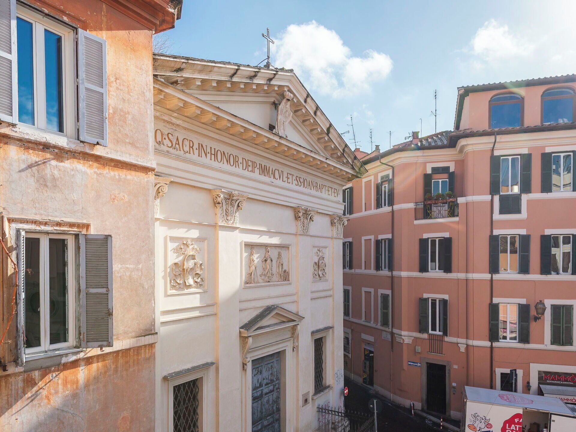 A building with classical architecture, including ornate carvings and a prominent entrance.