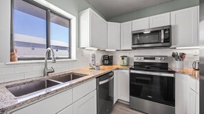 Fridge, microwave, oven, stovetop - Gulf view 2BR w/ 2 pools, direct beach & lagoon access (Gulf Shores)