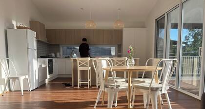 Coastal Retreat at Long Beach - golden sunset on the deck