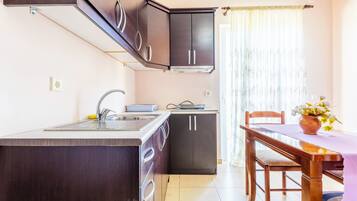 Familieleilighet, delvis sjøutsikt | Spisestue