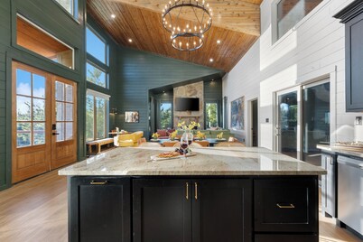 Pool, sauna, and pickleball set among the pines—your private Broken Bow retreat for unforgettable sunsets and group getaways